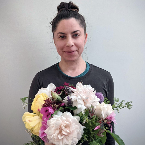 Stacy Jacobsen with a handful of blooms