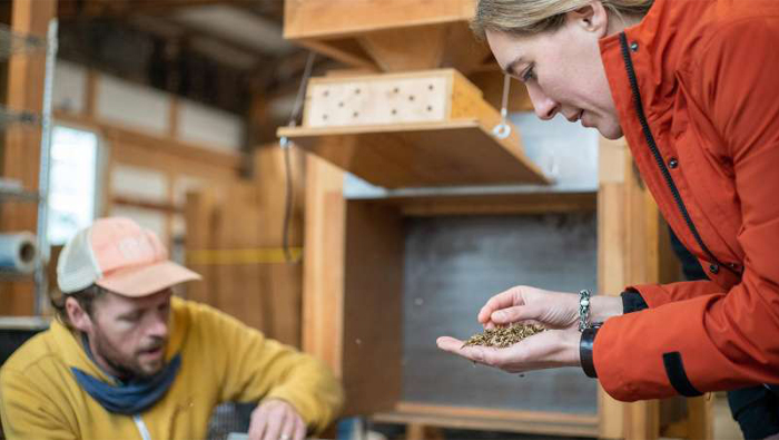 Erin Benzakein with a handful of flower seeds