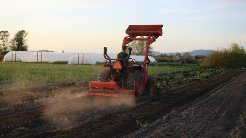 Chris Benzakein plowing the field