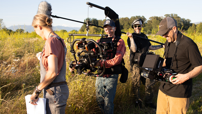 Erin Benzakein and the Blue Chalk film crew in the Floret field